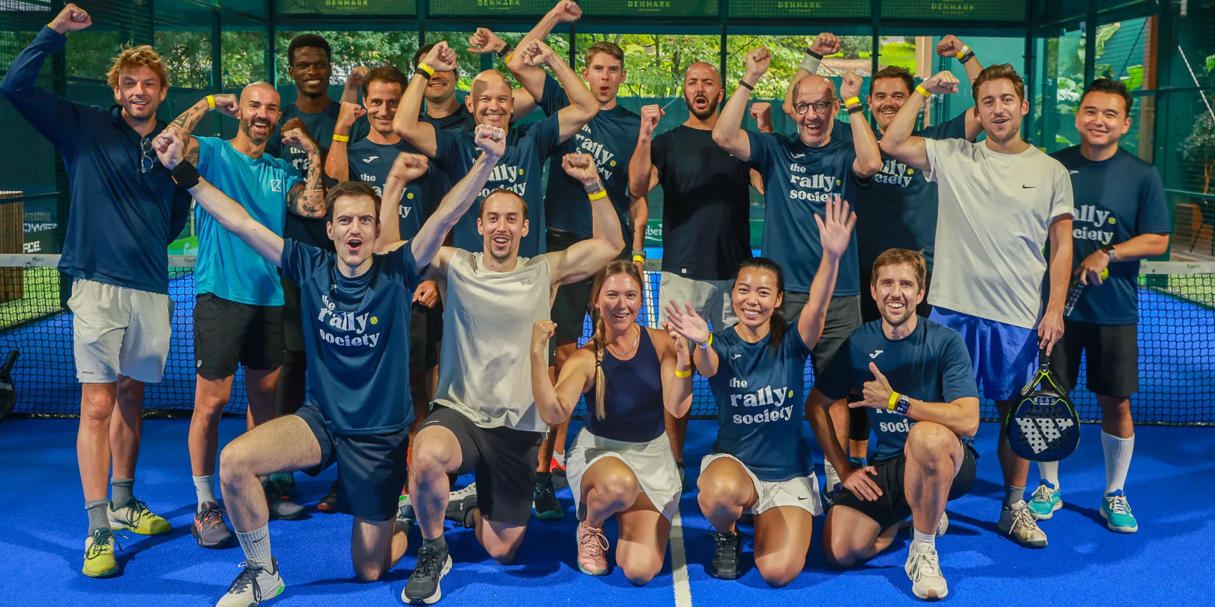 Rally members playing padel