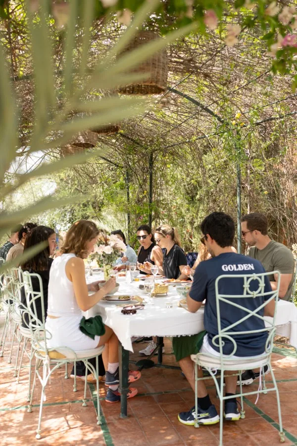 Members share a long lunch together at the retreat